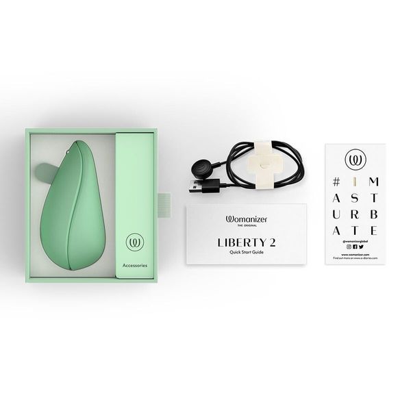 Вакуумний кліторальний стимулятор Womanizer Liberty 2 Sage, 8 режимів, магнітна кришечка SX0520 фото - купити в секс-шопі Чорний Кролик
